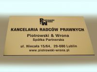 Tablica informacyjna Kancelarii Radców Prawnych